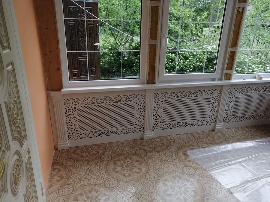 Decorative grilles for heating radiators for the veranda of the house